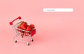Fresh strawberry in shopping card on pink background. Online shopping and Valentines Day minimalistic concept.