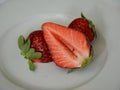 fresh red sweet strawberrys, Erdbeere, three strawberry fruits,