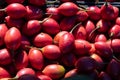 Fresh red tamarillo fruit vegetable at market stall in Portugal Royalty Free Stock Photo