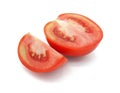 Fresh red tomato cut in half and piece, Isolated on white background. Royalty Free Stock Photo