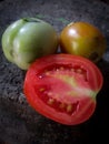 fresh red tomato fruit and vegetable slices Royalty Free Stock Photo