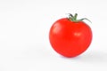 Fresh red tomato with green spine