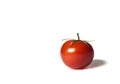 Fresh red tomato on a white background. Isolated Royalty Free Stock Photo