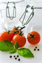 Fresh red tomatoes with basil leaf Royalty Free Stock Photo