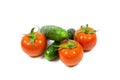 Fresh red tomatoes and cucumbers with water drops isolated on white background Royalty Free Stock Photo