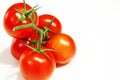 Fresh red tomatoes with green stalk Royalty Free Stock Photo