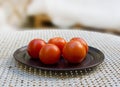 Fresh red tomatoes plate