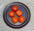 Fresh red tomatoes plate