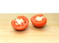 Fresh red tomatoes on wooden background.