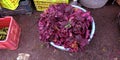 Fresh red vegetable kept in plastic basket