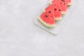 Fresh red watermelon slices White concrete background S Royalty Free Stock Photo