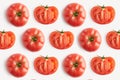 Fresh red whole and sliced tomato isolated pattern isolated from above, concept of healthy food and nutrition, space for layout. Royalty Free Stock Photo