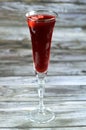 Fresh refrigerated Roselle juice glass made from boiling dried Roselle herbs in water, a bissap wonjo juice, flowers of the Royalty Free Stock Photo