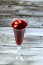 Fresh refrigerated Roselle juice glass made from boiling dried Roselle herbs in water, a bissap wonjo juice, flowers of the Royalty Free Stock Photo