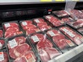 Fresh ribeye steak in the refridgerated meat aisle of a Sams Club grocery store