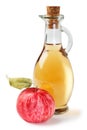 Fresh ripe apples and apple cider vinegar. White background