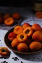 Fresh ripe apricots in bowl in rustic style