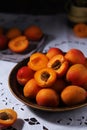 Fresh ripe apricots in bowl in rustic style