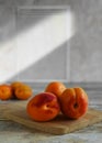 Fresh ripe apricots on a wooden background, copy space. Apricots are rich in vitamins and minerals such as: vitamin A, beta- Royalty Free Stock Photo