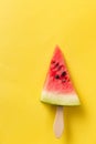 Fresh and ripe berry. Summer watermelon slice popsicles on bright yellow background. Design for cover, wallpaper, device Royalty Free Stock Photo