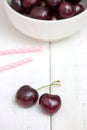 Fresh ripe black cherries in a white bowl Royalty Free Stock Photo