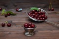 fresh ripe cherries on dark wooden background Royalty Free Stock Photo