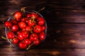 Fresh ripe cherries in glass bowl on wooden table. Top view Royalty Free Stock Photo