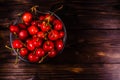 Fresh ripe cherries in glass bowl on wooden table. Top view Royalty Free Stock Photo