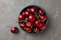 Fresh ripe cherries on grey table, flat lay Royalty Free Stock Photo