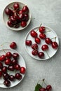 Fresh ripe cherries on light grey table, flat lay Royalty Free Stock Photo