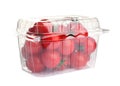 Fresh ripe cherry tomatoes in plastic container on white background Royalty Free Stock Photo