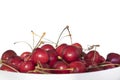 Fresh ripe cherry on white plate isolated on white background. Red sweet cherries side view Royalty Free Stock Photo