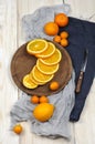 Fresh ripe citrus. Lemons, kumquat and oranges on wooden table Royalty Free Stock Photo