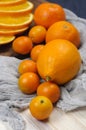 Fresh ripe citrus. Lemons, kumquat and oranges on wooden table Royalty Free Stock Photo