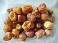 fresh ripe dates in plastic container Royalty Free Stock Photo