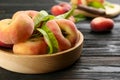 Fresh ripe donut peaches on wooden table, closeup Royalty Free Stock Photo