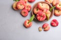 Fresh ripe donut peaches on light table, flat lay. Space for text Royalty Free Stock Photo