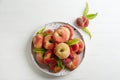 Fresh ripe donut peaches on white wooden table, flat lay Royalty Free Stock Photo