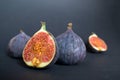 Fresh ripe figs on dark table. Healthy mediterranean fig fruit. Fresh figs on black background. Royalty Free Stock Photo