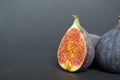 Fresh ripe figs on dark table. Healthy mediterranean fig fruit. Royalty Free Stock Photo