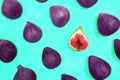 Fresh ripe figs on pastel mint green background.