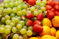 Fresh ripe fruits, grapes, strawberry, tangerines. Close up Royalty Free Stock Photo