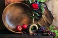 Fresh ripe grapes. Grape harvest. Handmade wooden utensils on the kitchen table. Wooden plates, bowls and dishes on the table. Royalty Free Stock Photo