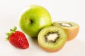 Fresh ripe green apple, kiwi and strawberry Royalty Free Stock Photo