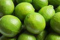 Fresh ripe green limes as background, closeup Royalty Free Stock Photo