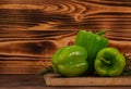 Fresh ripe green peppers with drops of water