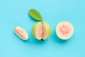 Fresh ripe guava with leaf on blue background