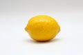 Fresh, ripe, isolated, juicy single lemon on a white background. Studio macro shoot