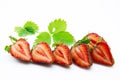 Fresh, ripe, juicy and mouth-watering strawberries with green leaves Royalty Free Stock Photo