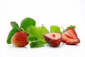 Fresh, ripe, juicy and mouth-watering strawberries with green leaves Royalty Free Stock Photo